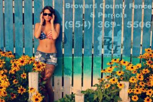 girl on fence in broward county florida