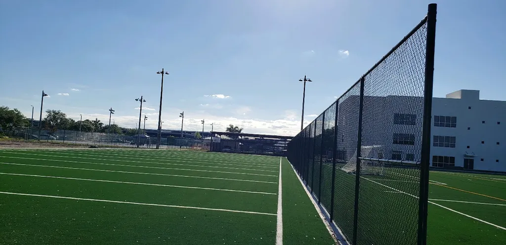Black chain link fence around professional soccer field